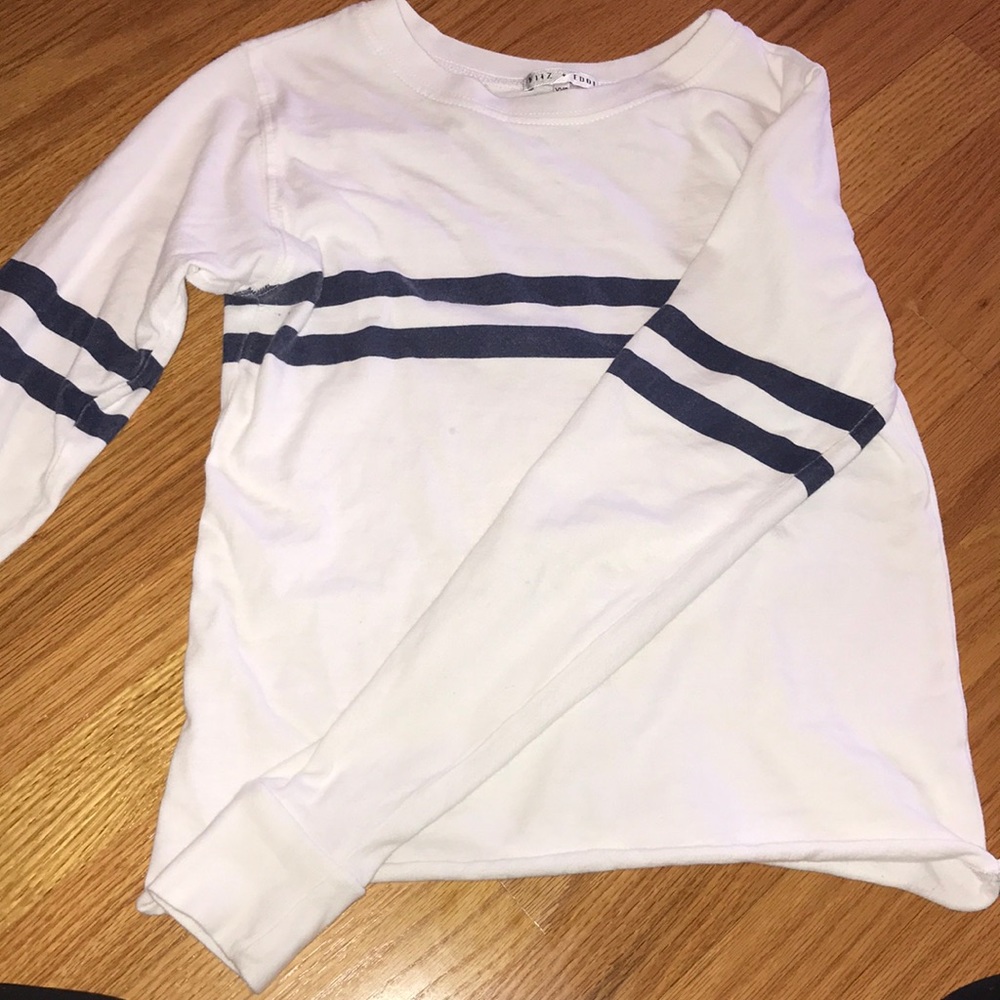 white and navy blue long sleeve tee